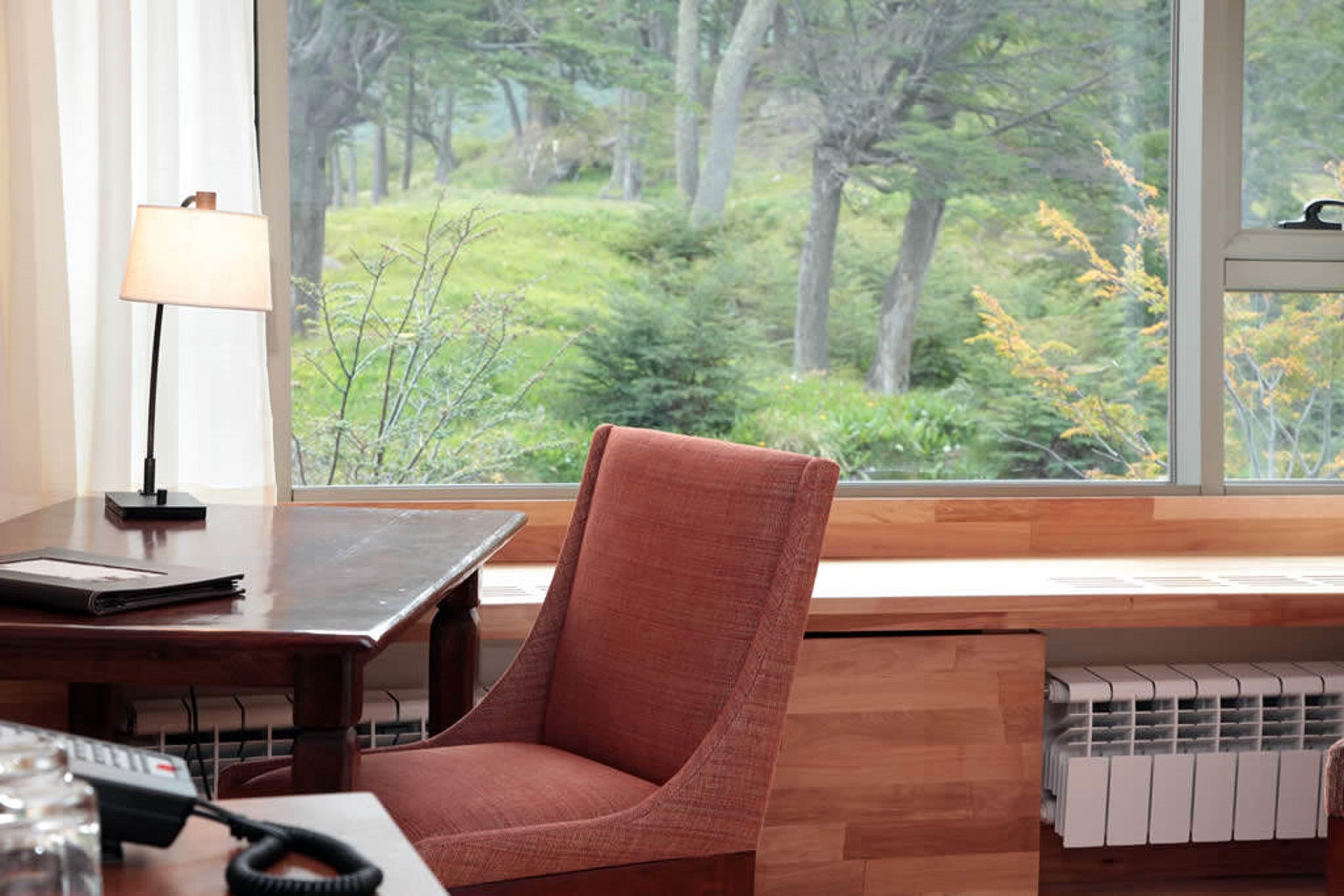 Arakur Ushuaia Resort & Spa ภายนอก รูปภาพ A view of the woods from the library