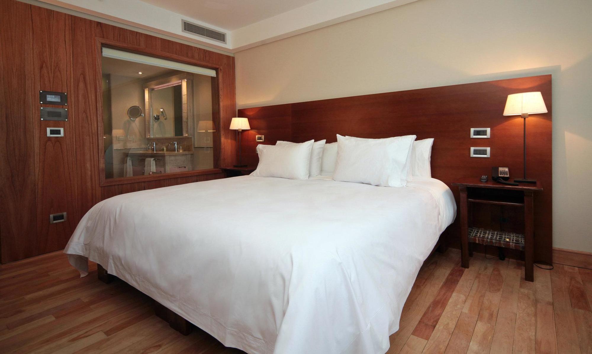 Arakur Ushuaia Resort & Spa ภายนอก รูปภาพ A bedroom at the hotel